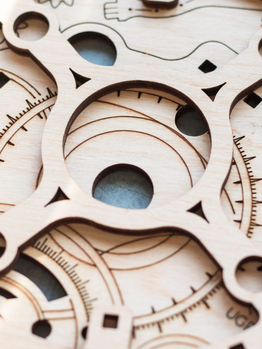Laser-cut wooden sheets for assembling mechanical or decorative models.